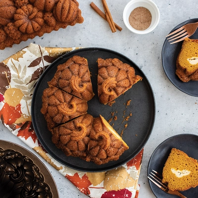 7---95748_Overhead_Pumpin_Patch_Bundt_Cake_with_fall_loaf_cake_fall_scene_1K__24219.1694554025.1280.1280