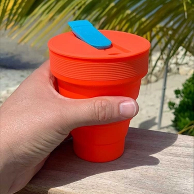 5---7432_collapsible-cup_coral_lifestyle-3_LoRes-e1679481346348