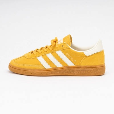 Adidas white and yellow trainers online