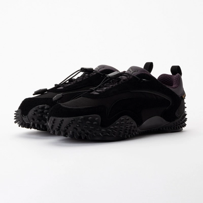 PUMA Unisex Mostro XC GTX PUMA Black / Midnight Plum 25 | Sneaker