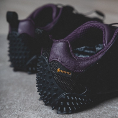 PUMA Unisex Mostro XC GTX PUMA Black / Midnight Plum 25 | Sneaker