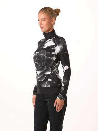 4---toni-sailer-women-ski-first-layer-wieka-print-black-model-side_e253c0f6-ab90-4df0-9fe4-744aa55fabdb