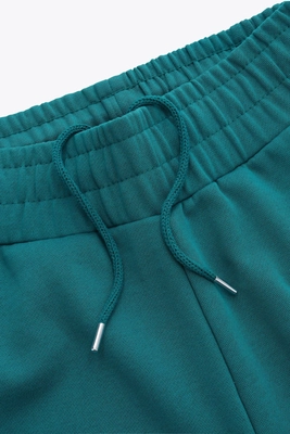 3---APP00236_6098_3_Men_Wide_Sweatpants_Transformative_Teal