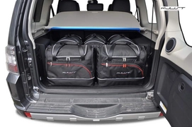 Tassenset Kjust Mitsubishi Pajero 2006+  (5-delig) Variant II